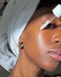 Applying serum during a skincare routine