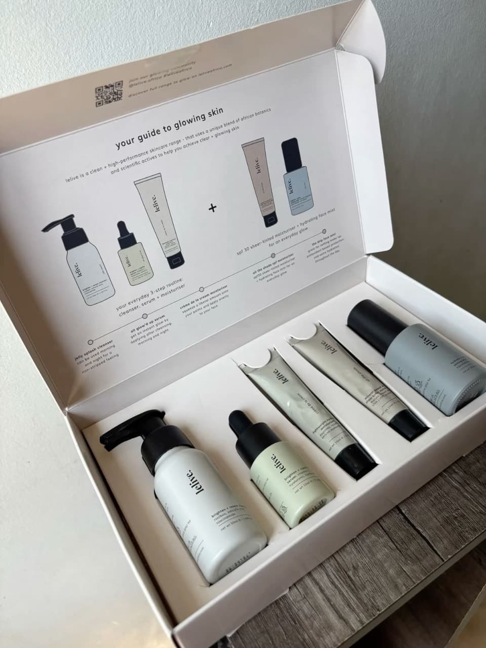 A Lelive skincare routine set in its open box